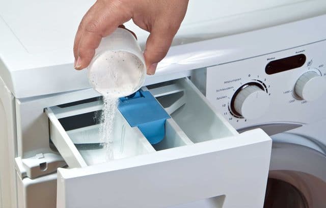 Poudre dans le bac de la machine à laver